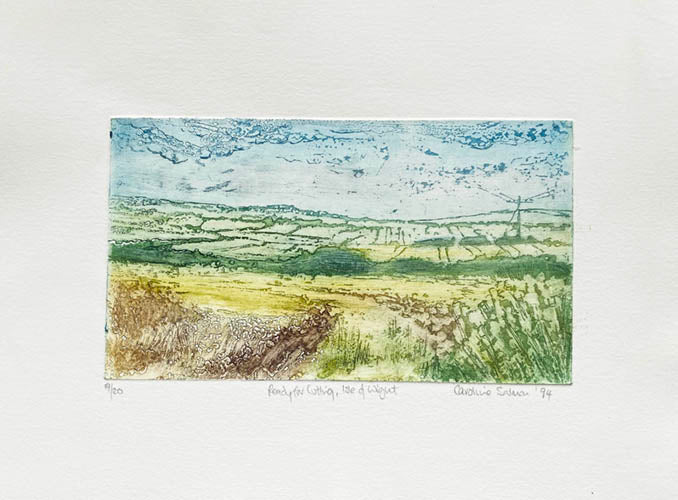 Aquatinted Etching of a landscape on the Isle of Wight with fields and a blue sky.