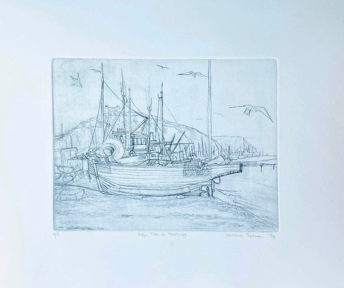 Drypoint Etching of boats pulled up on the shingle at Hastings with seagulls flying around  Blue/grey on cream background