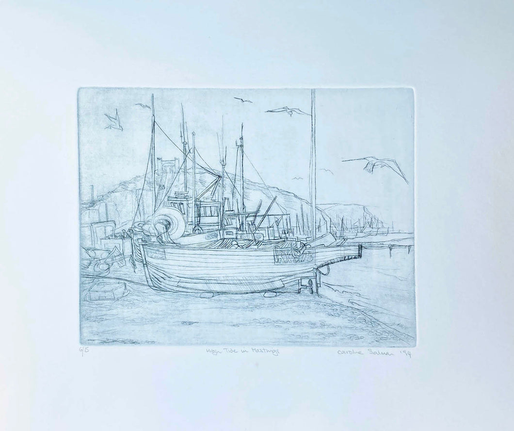Drypoint Etching of boats pulled up on the shingle at Hastings with seagulls flying around  Blue/grey on cream background