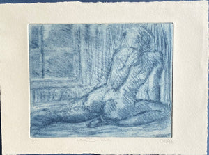 Etching  in blue n cream paper of the back of a nude recumbent on the floor looking out of a window