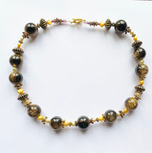 Artisan Necklace with Big Brown and Gold beads and gold pearls 