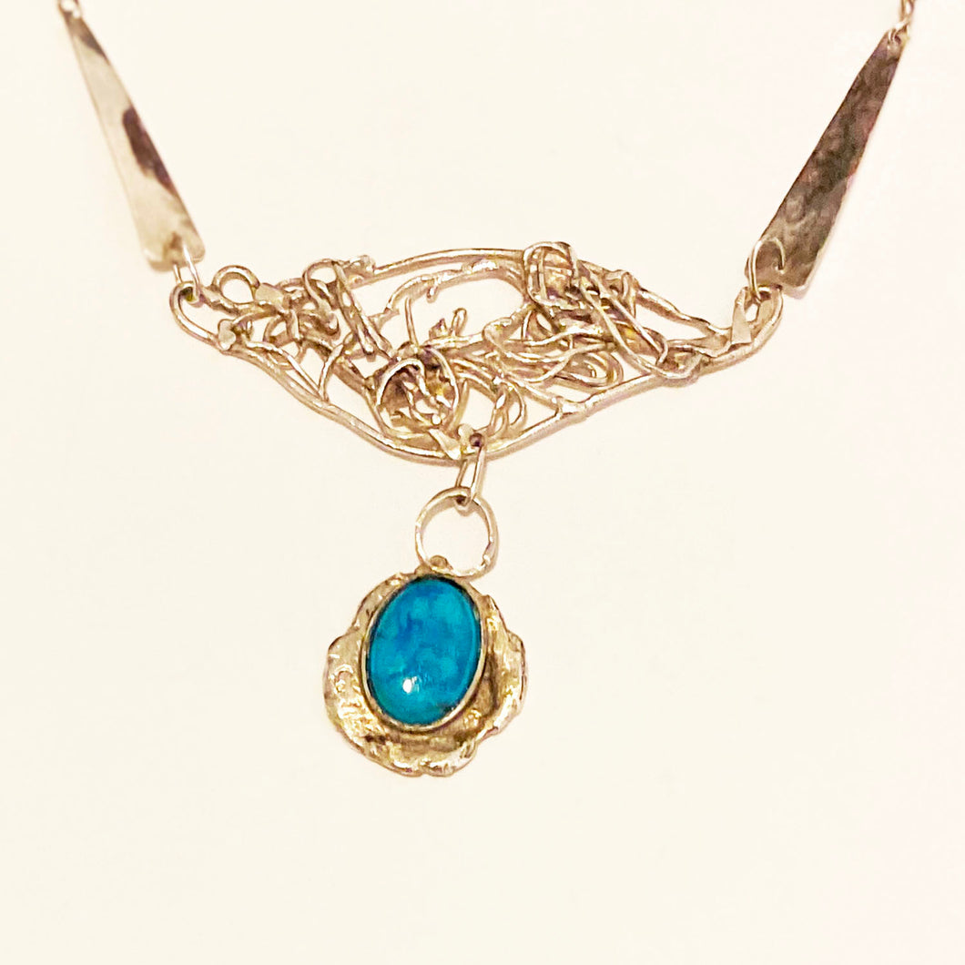 Motif of Silver Necklace with Turquoise Drop