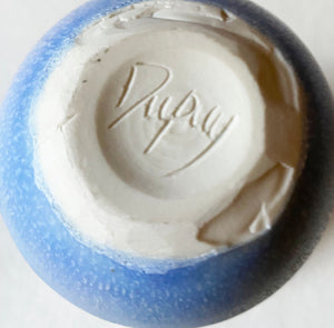 Blue flared Vase base showing ground glaze and chips