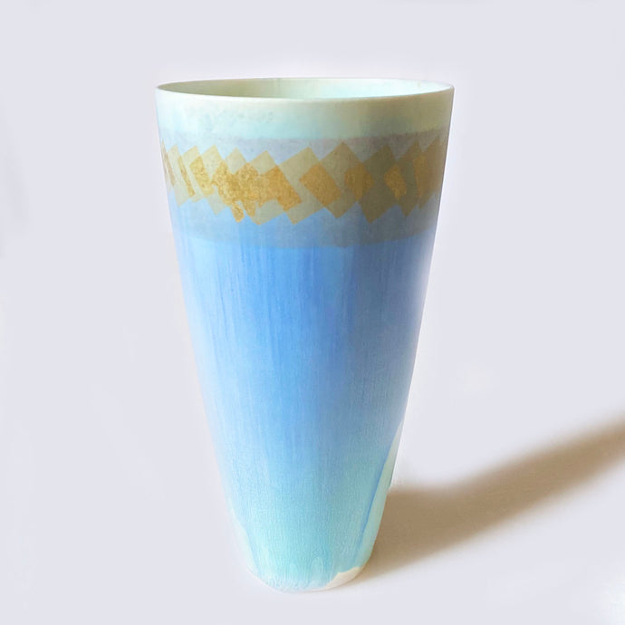 Tall Blue vase with gold leaf squares by Phylis Dupuy - note glaze piece missing at base