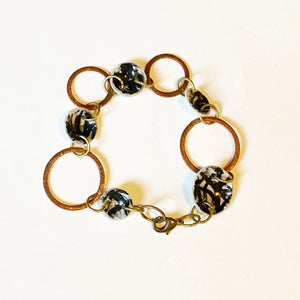 Recycled Black and White Plastic Domes with copper disc Bracelet by Bags to Riches