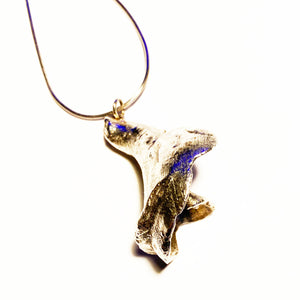 Silvered Worn Welk on chain from Bracklesham Bay