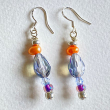 Blue teardrop Swarovski crystal bead and peach freshwater pearl bracelet and earring set by Caroline Salmon