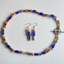 Cobalt blue, orange, crystal and metal heart choker with matching drop earrings by Caroline Salmon