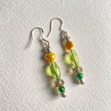 Pair of drop earrings with silver hoops and yellow and cream beads