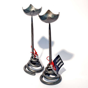 Par of small wrought iron candlesticks by Ferric Fusion